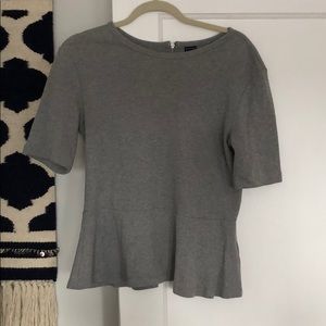Gray peplum style short sleeve shirt